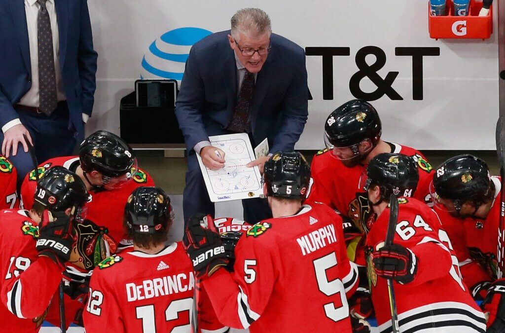 Father and son Marc and Dylan Crawford bring old- and new-school mentalities to Blackhawks coaching staff