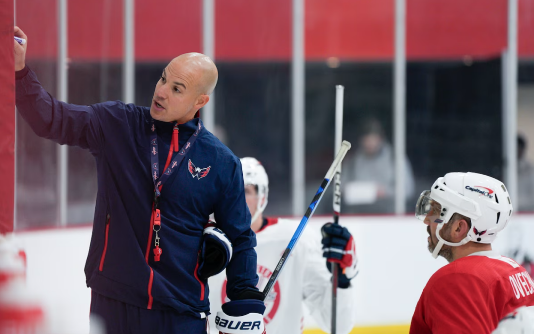 He coaches pro hockey. Want to see him geek out? Ask him about the NFL.